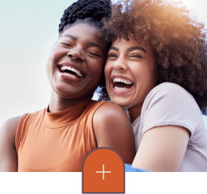 a man and a woman smiling for the camera